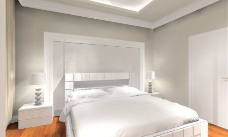 Elegancka, jasna sypialnia.