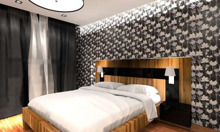 projekt sypialni z dekoracyjną tapetą w kwiaty