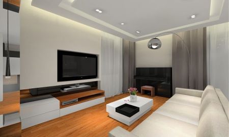 Telewizor został wbudowany w ściankę z gips kartonu.