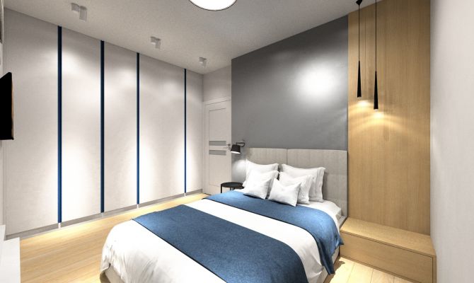 Nowoczesna sypialnia z szarą ścianą i białymi meblami. Niebieskie akcenty kolorystyczne nawiązują do reszty mieszkania.