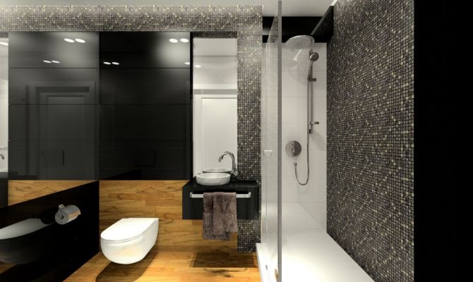 W małej łazience dla gości zastosowano czarne szkło połączone z mozaiką Dell'Arte.