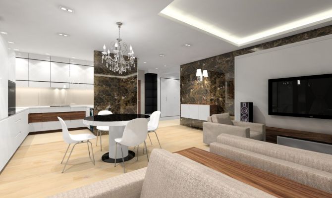 W strefie dziennej przykuwają wzrok ściany pokryte dekoracyjnym marmurem emperador dark.