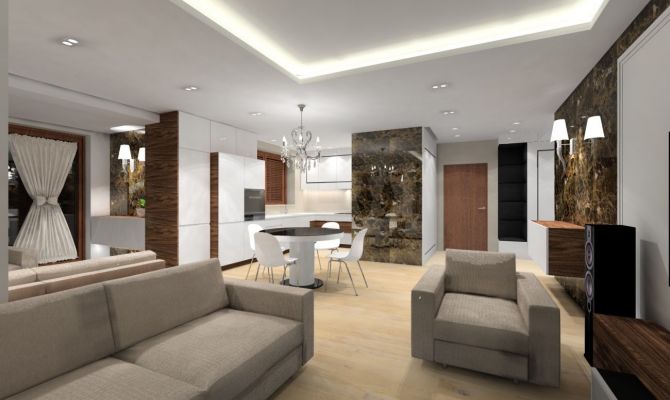 W strefie dziennej przykuwają wzrok ściany pokryte dekoracyjnym marmurem emperador dark.