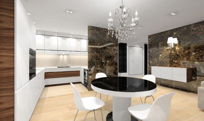 W strefie dziennej przykuwają wzrok ściany pokryte dekoracyjnym marmurem emperador dark.