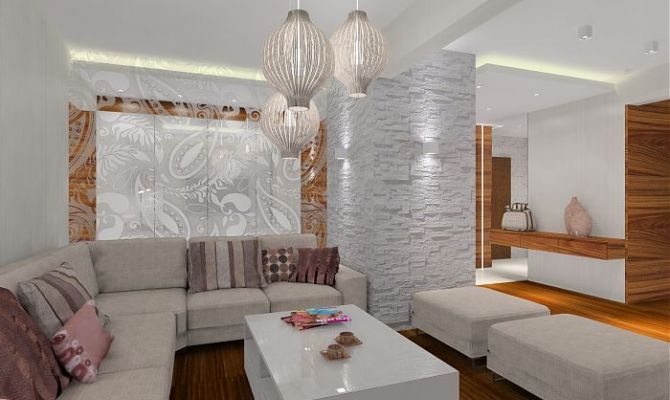 Projekt przytulnego apartamentu z dodatkiem naturalnego kamienia oraz szklaną przesłoną oddzielającą salon od holu. Na filarze dekoracyjny 