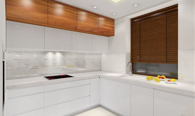 Projekt przytulnego apartamentu z dodatkiem naturalnego kamienia oraz szklaną przesłoną oddzielającą salon od holu. Na filarze dekoracyjny 