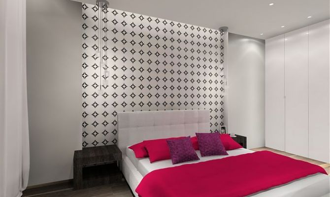 Sypialnia z graficzną tapetą