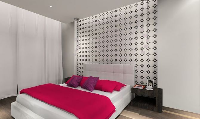 Sypialnia z graficzną tapetą