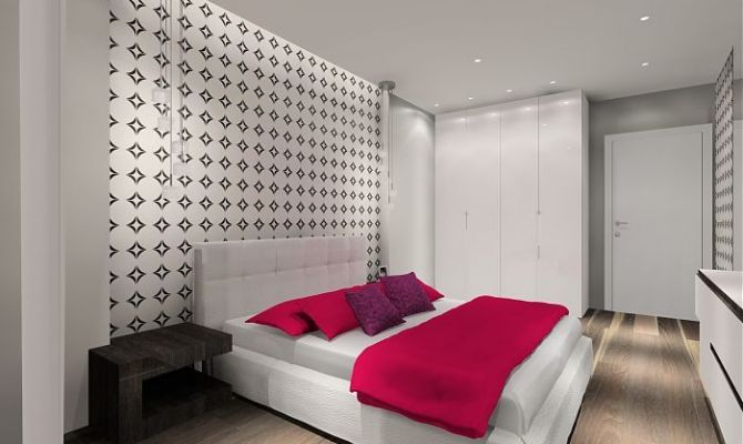 Sypialnia z graficzną tapetą